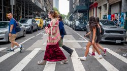 High school app crossing a street in New York City