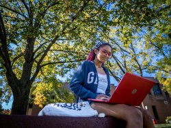 app State University student on laptop.